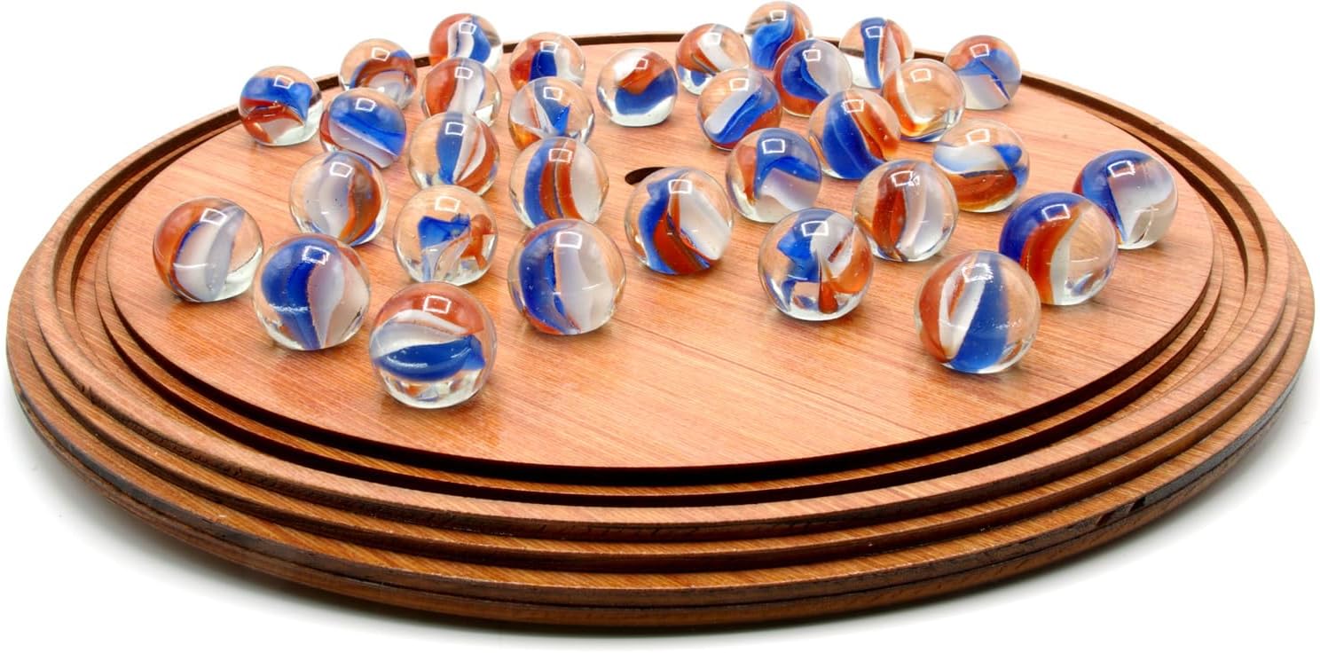 Wooden solitaire board game with colourful glass marbles 