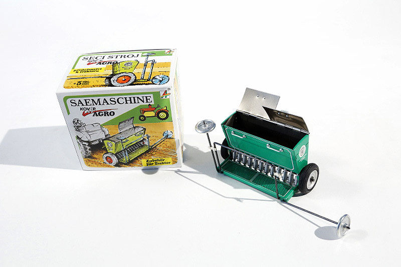 Sowing Machine tin toy with packaging