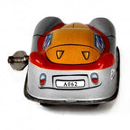 Rear of Space Tin Toy car with wind up key