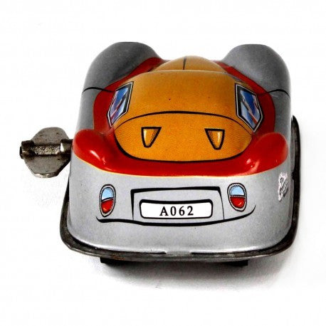 Rear of Space Tin Toy car with wind up key