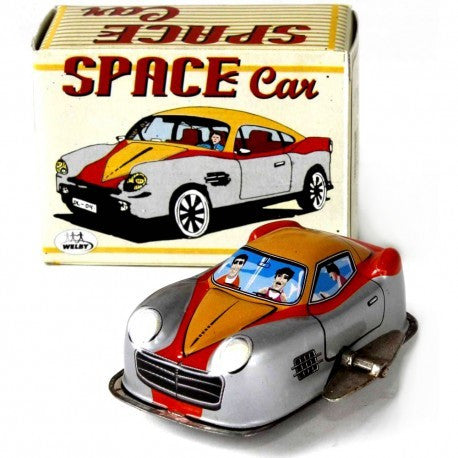 Space car Tin Toy  with packaging featuring the words 'Space car'.