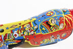 Colourful Space rocket tin toy  with space-themed graphics 