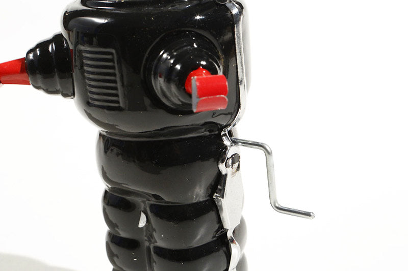 Space trooper tin toy with wind up mechanism 