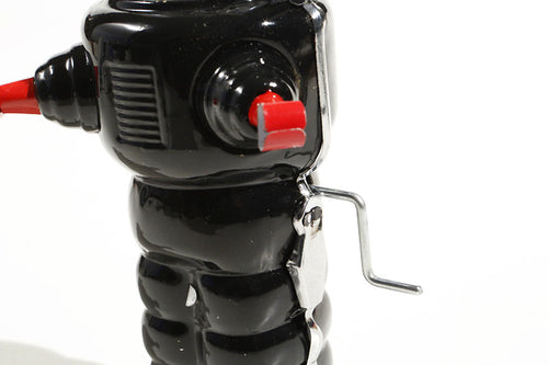 Space trooper tin toy with wind up mechanism 