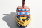 Close up of Tin Treasure's Pop Pop Speed Boat tin toy