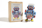 Spikey hair drumming Vintage-style robot tin toy with packaging