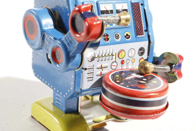 Spikey hair drumming Vintage-style robot tin toy