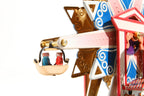 Close up of the star Ferris wheel tin toy