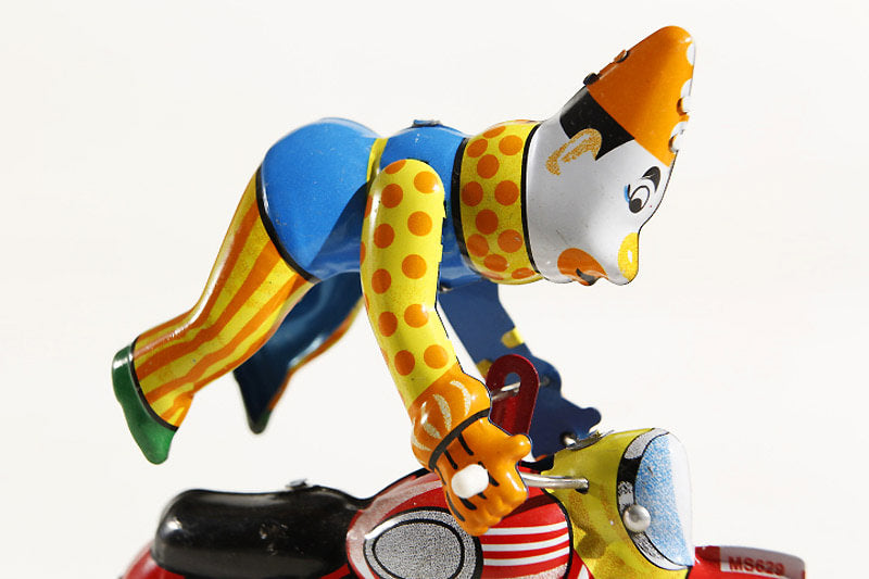 Close up of Stunt Clown on motorcycle tin toy