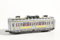 subway train tin toy with passengers 