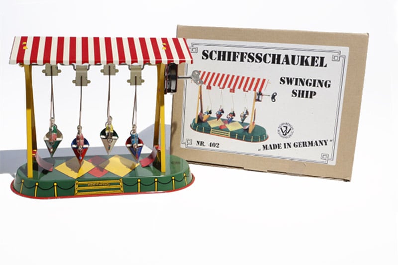 Swing Boats tin toy with packaging