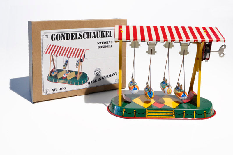 Swing Rocket Tin Toy with packaging