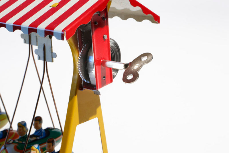 Swing Rocket Tin Toy key