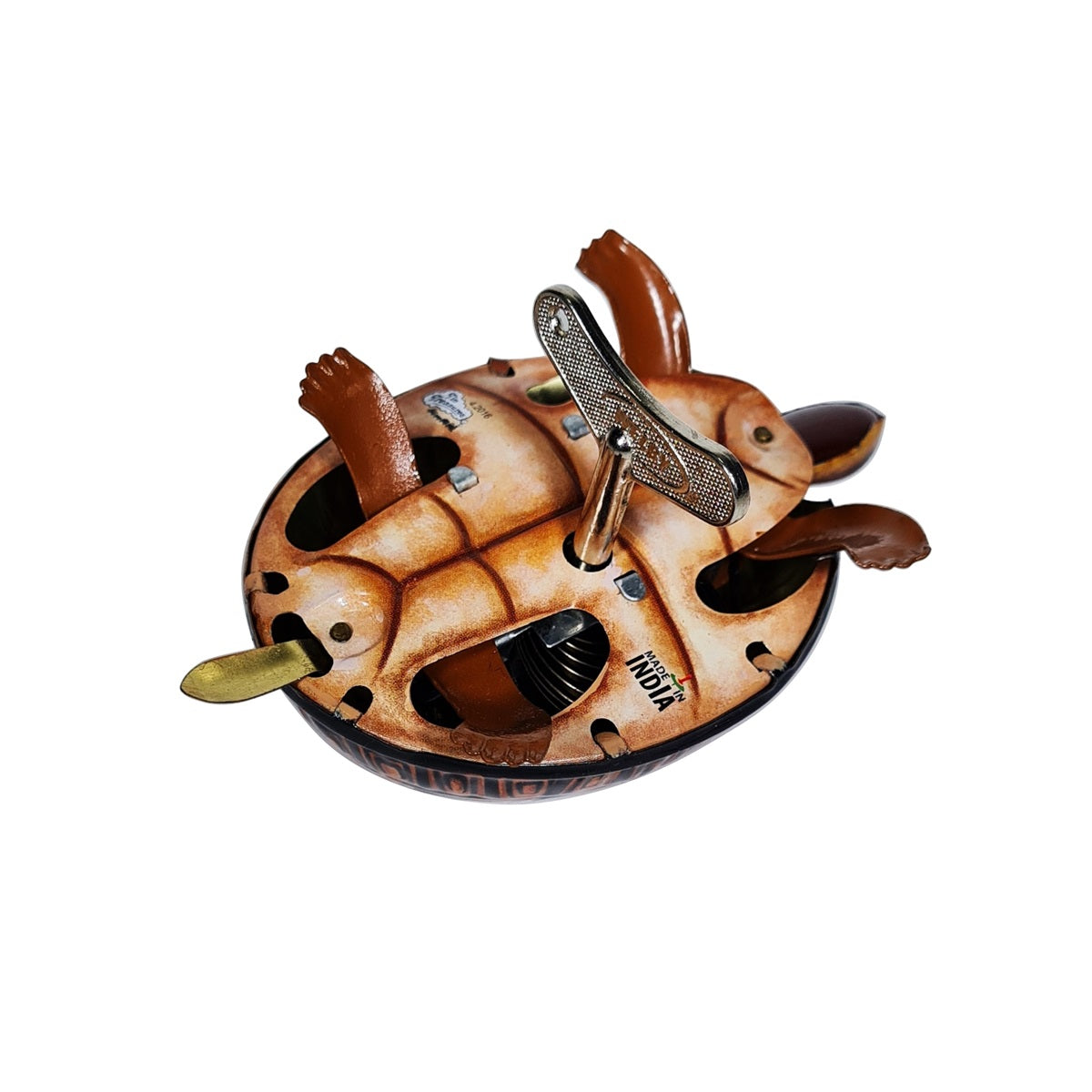 bottom of tortoise tin toy with wind up key