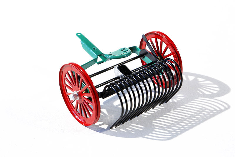 Towed Rake tin toy