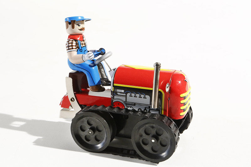 Caterpillar tractor tin toy