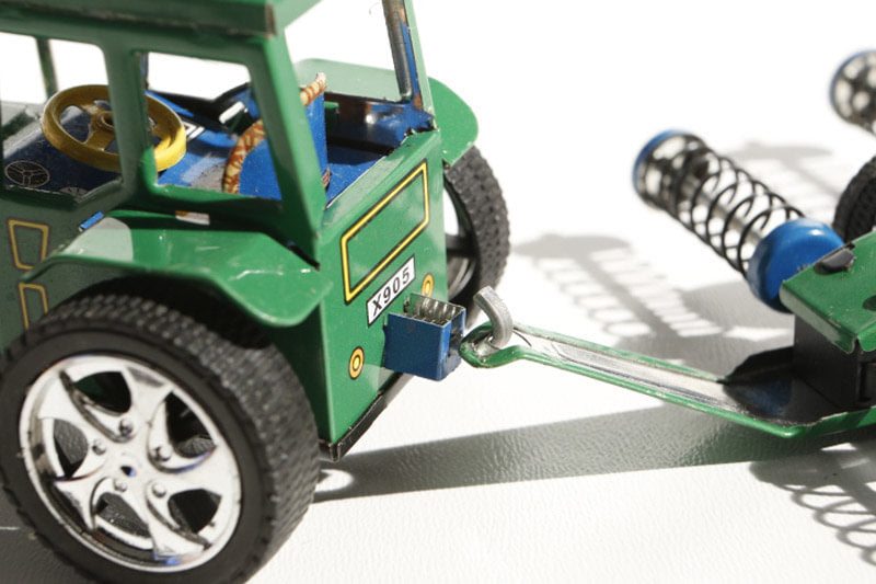 Cloe up of Tractor with Disc Harrow tin toy