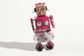 Venus Tin Toy robot with pink and silver outfit 