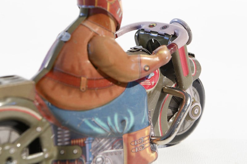 Close up of Vintage Motorcycle tin toy