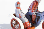 Close up of Vintage Motorcycle with Side Car tin toy with rider and passenger