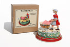 Washer Woman tin toy with packaging