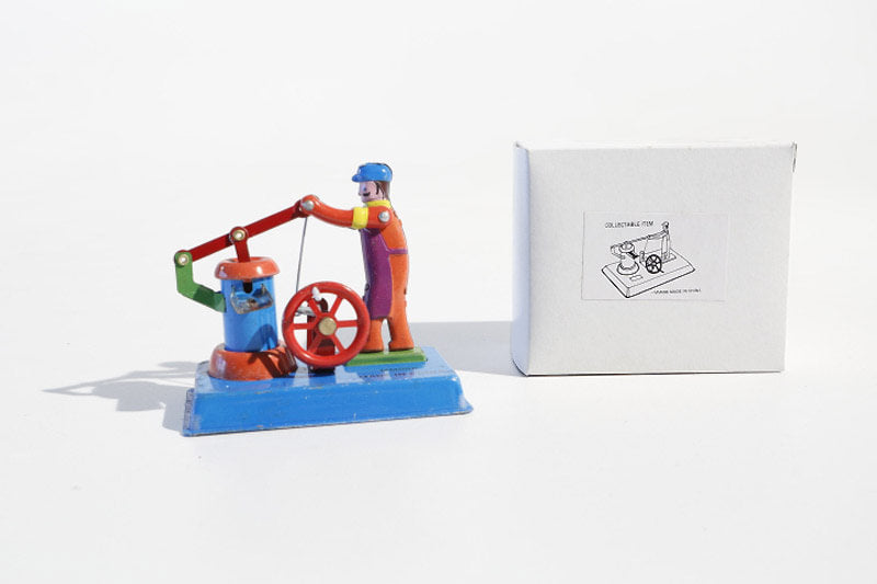 Water well tin toy with packaging