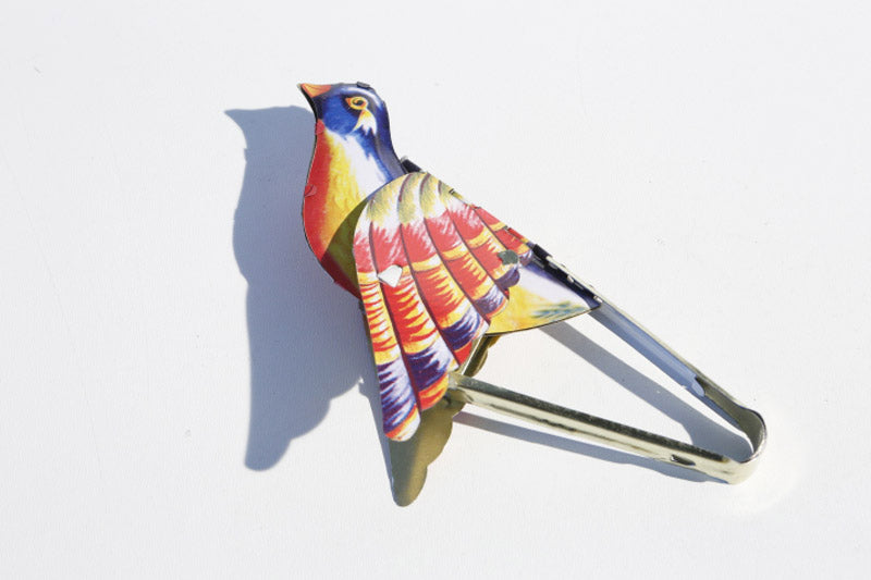 Colourful whistling bird tin toy