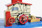 Close up of Windmill Tin Toy