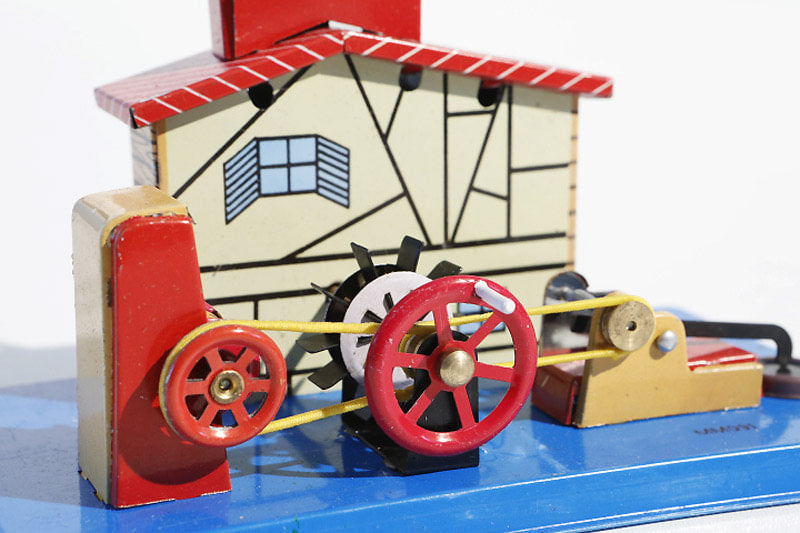 Close up of Windmill Tin Toy