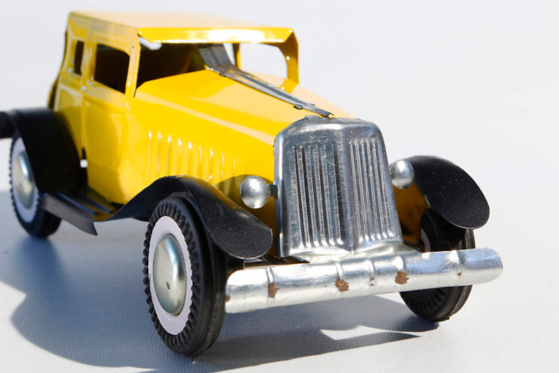 Yellow ol timer classic car tin toy 